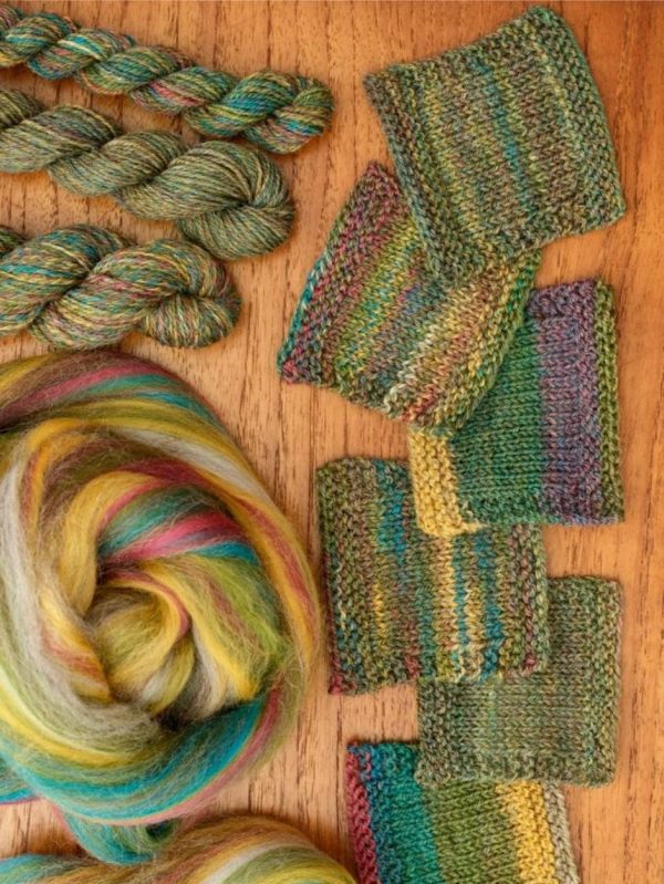 Fibre and yarn with swatches showing various colour effects.